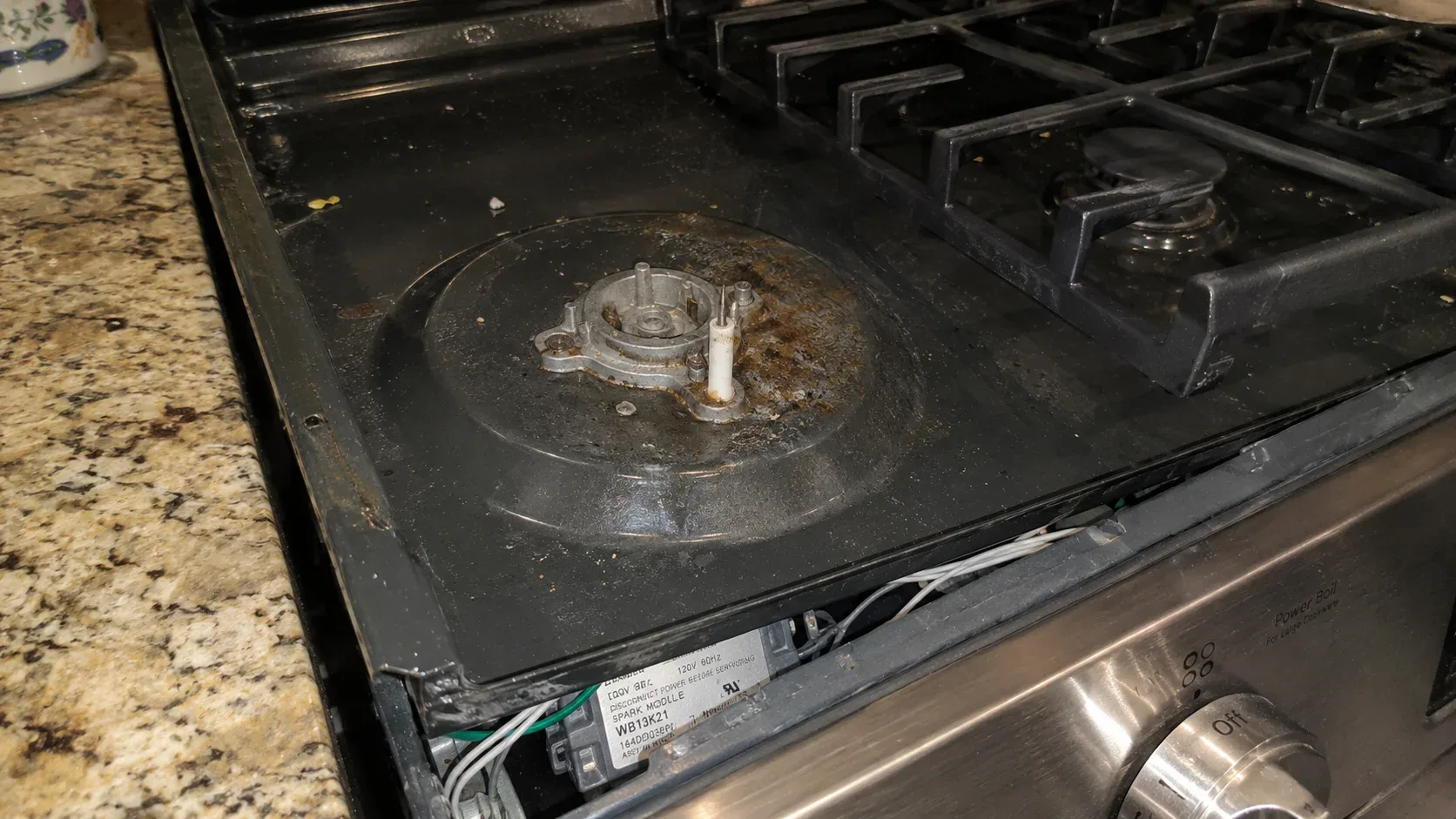 Gas stove burner igniter clicking continuously