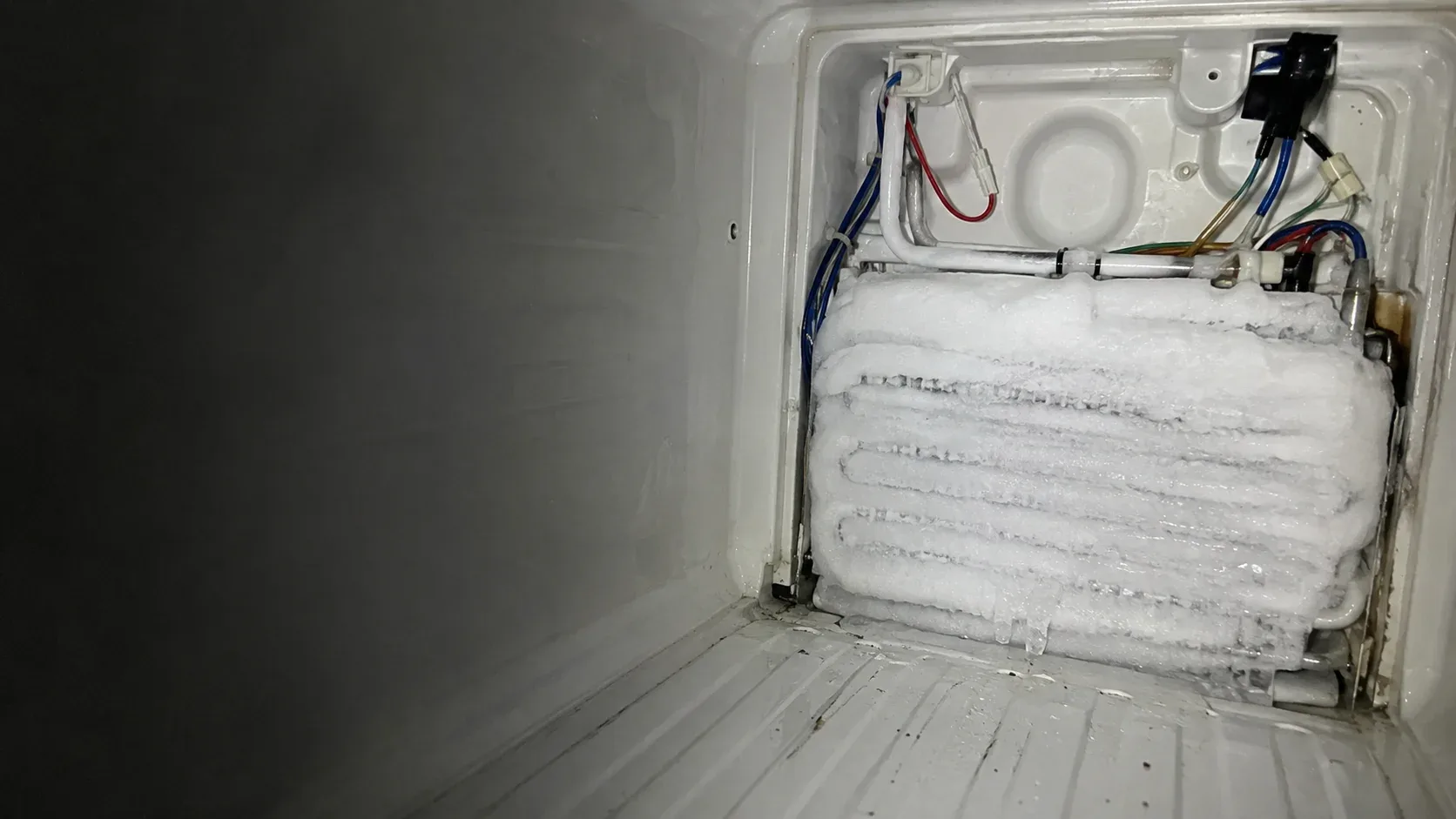 Iced-over evaporator inside a French-door refrigerator